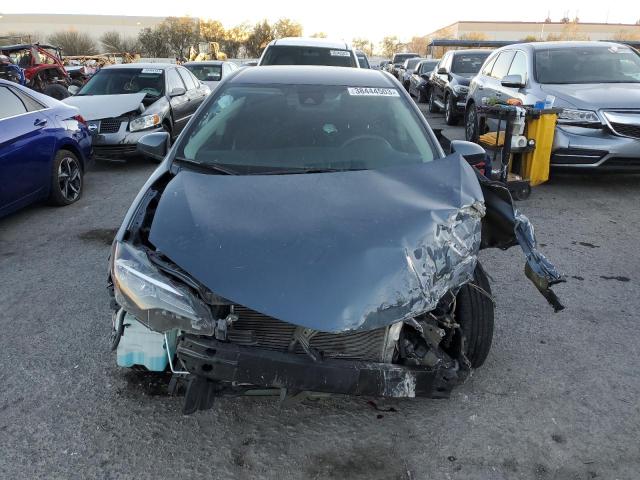 Photo 5 from auction – 2018 TOYOTA COROLLA LE with VIN 2T1BPRHE0JC020152