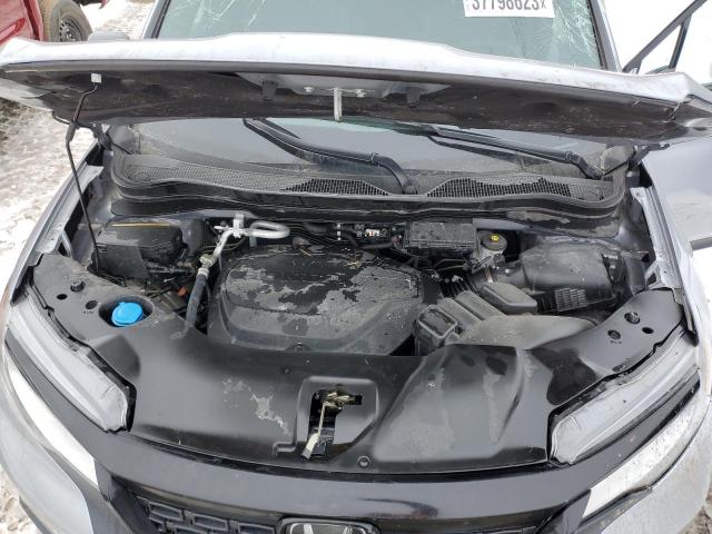 Photo 12 from auction – 2021 HONDA PASSPORT E with VIN 5FNYF8H04MB039119
