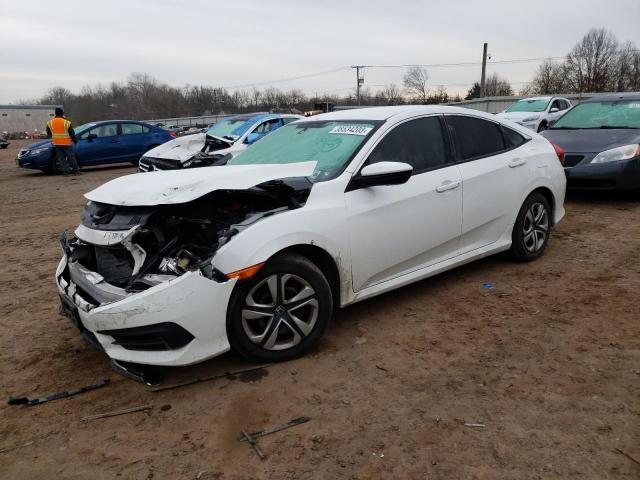 HONDA CIVIC LX 2018 with VIN 2HGFC2F55JH509600 - Photo from auction