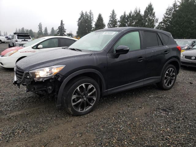 MAZDA CX-5 GT 2016 with VIN JM3KE4DY4G0886794 - Photo from auction