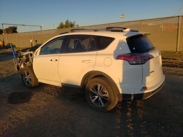 Photo 2 from auction – 2016 TOYOTA RAV4 XLE with VIN JTMWFREV8GJ099320