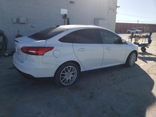 Photo 3 from auction – 2018 FORD FOCUS SE with VIN 1FADP3F22JL273518