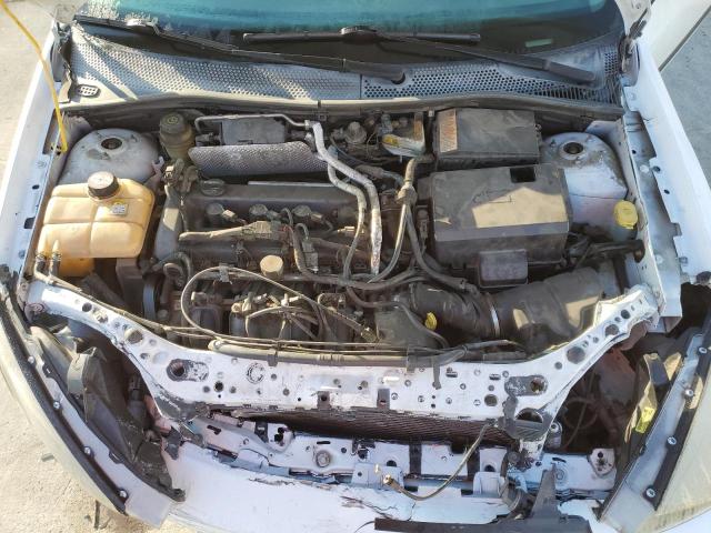 Foto 11 de la subasta – 2004 FORD FOCUS LX con VIN 1FAFP33ZX4W140387