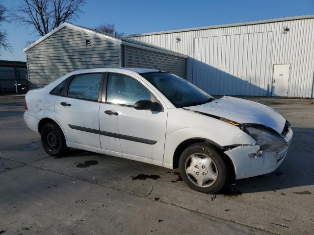Foto 4 de la subasta – 2004 FORD FOCUS LX con VIN 1FAFP33ZX4W140387