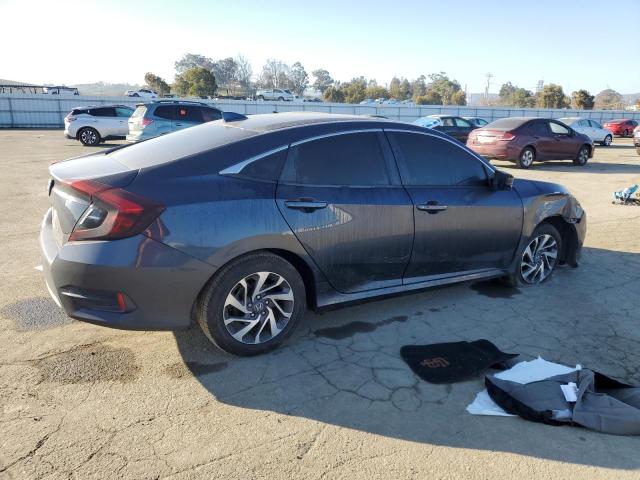 Photo 3 from auction – 2018 HONDA CIVIC EX with VIN 2HGFC2F88JH559630