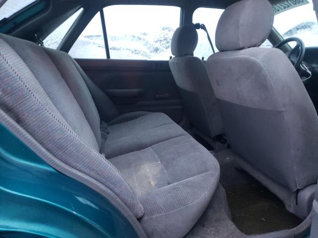 Photo 10 from auction – 1994 FORD ESCORT LX with VIN 1FARP14J4RW157770