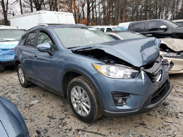 Photo 4 from auction – 2016 MAZDA CX-5 TOURI with VIN JM3KE4CY1G0871641