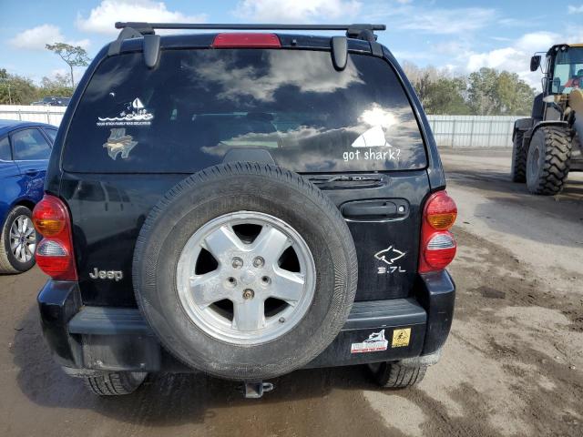 Photo 6 from auction – 2002 JEEP LIBERTY with VIN 1J4GL58K92W113626
