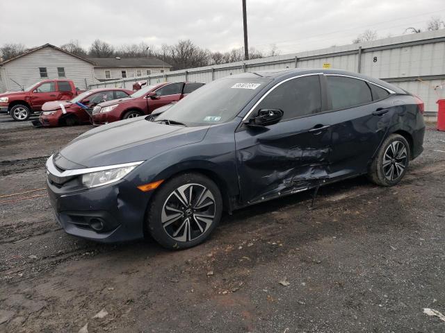 HONDA CIVIC EX 2017 with VIN 19XFC1F35HE200335 - Photo from auction