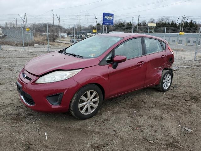 FORD FIESTA SE 2011 with VIN 3FADP4EJ0BM170063 - Photo from auction