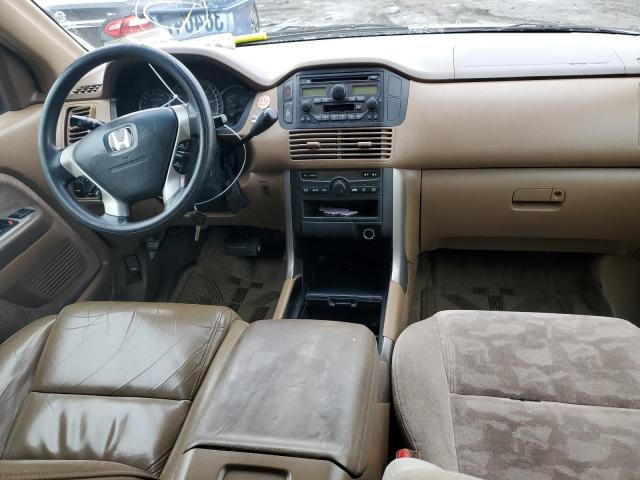Photo 8 from auction – 2004 HONDA PILOT with VIN 2HKYF18414H564943