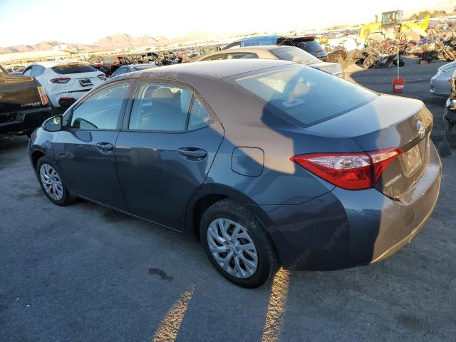 Photo 2 from auction – 2018 TOYOTA COROLLA L with VIN 5YFBURHEXJP841283
