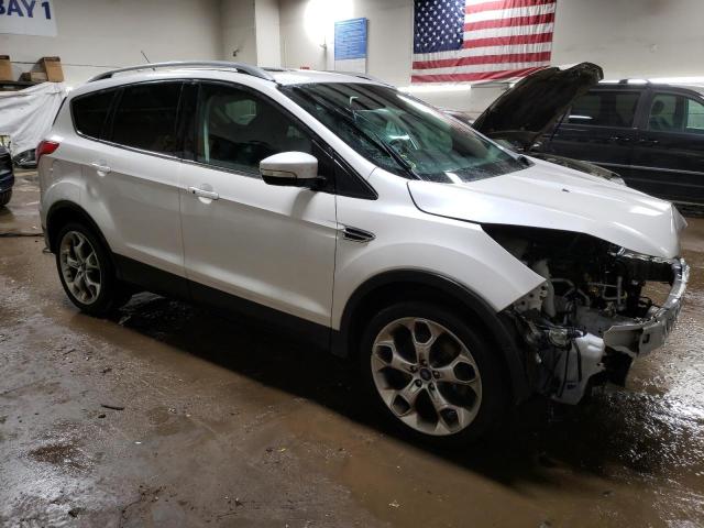 Photo 4 from auction – 2014 FORD ESCAPE TIT with VIN 1FMCU9JX3EUD24685