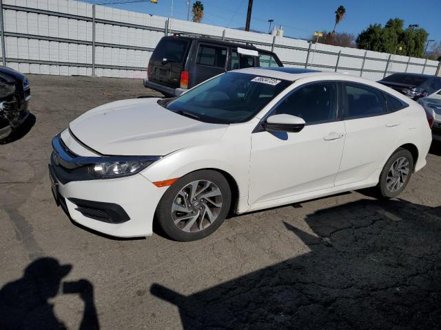 HONDA CIVIC EX 2018 with VIN 19XFC2F70JE205313 - Photo from auction