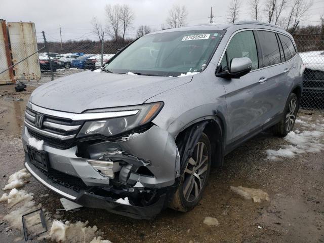 HONDA PILOT TOUR 2017 with VIN 5FNYF6H99HB086543 - Photo from auction