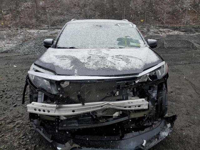 Photo 5 from auction – 2018 HONDA PILOT ELIT with VIN 5FNYF6H04JB051738