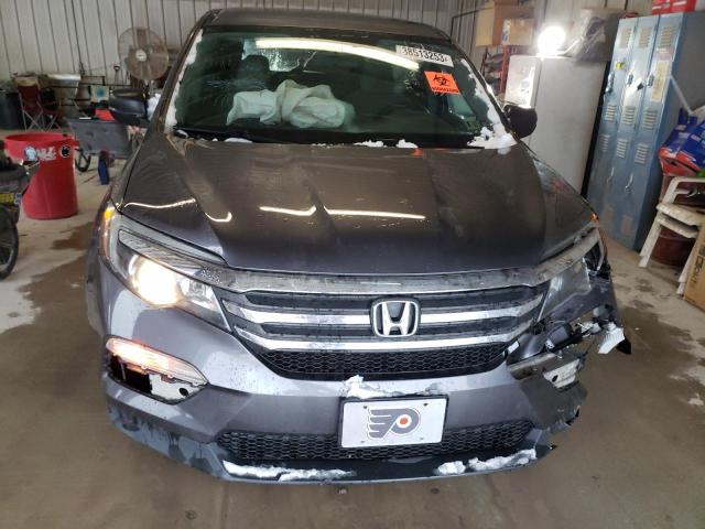 Photo 5 from auction – 2018 HONDA PILOT LX with VIN 5FNYF6H14JB051649