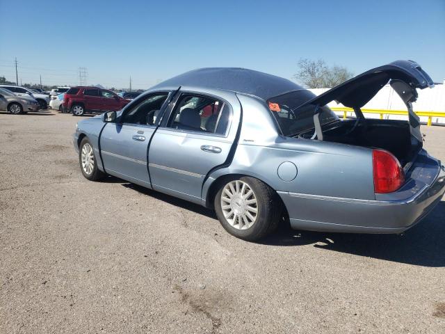 Photo 2 from auction – 2004 LINCOLN TOWN CAR E with VIN 1LNHM81WX4Y658940