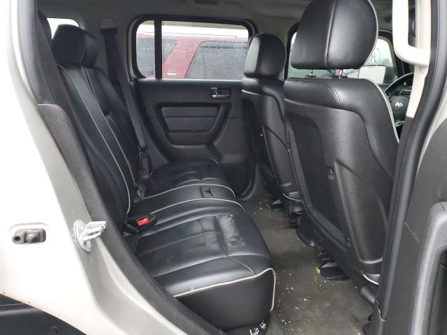 Photo 11 from auction – 2006 HUMMER H3 with VIN 5GTDN136868113948