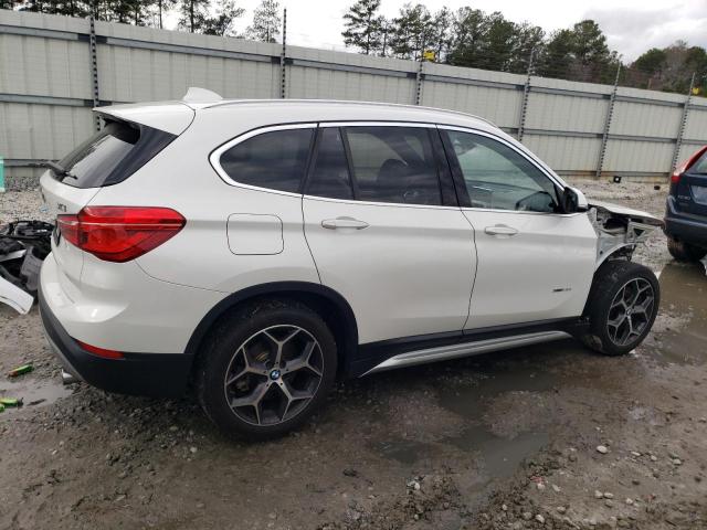 Photo 3 from auction – 2017 BMW X1 XDRIVE2 with VIN WBXHT3C30H5F68979