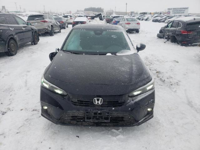 Photo 5 from auction – 2023 HONDA CIVIC TOUR with VIN 2HGFE1F95PH000221