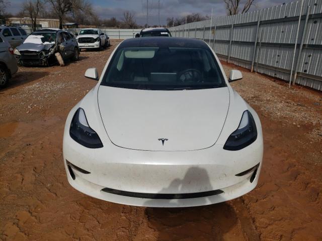 Photo 5 from auction – 2022 TESLA MODEL 3 with VIN 5YJ3E1ECXNF130447