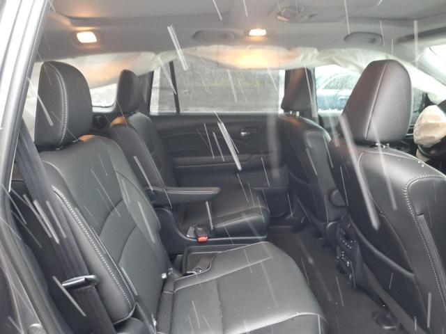 Photo 11 from auction – 2018 HONDA PILOT ELIT with VIN 5FNYF6H04JB051738