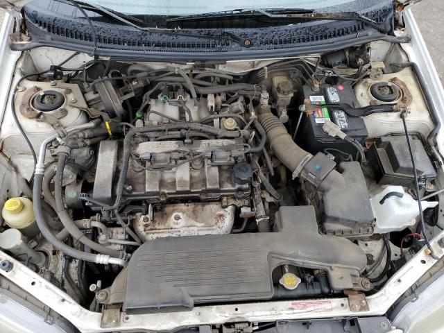 Photo 11 from auction – 2002 MAZDA PROTEGE DX with VIN JM1BJ225X21604596