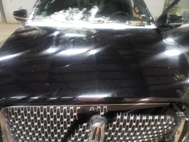 Photo 12 from auction – 2021 LINCOLN NAVIGATOR with VIN 5LMJJ2LT7MEL05015