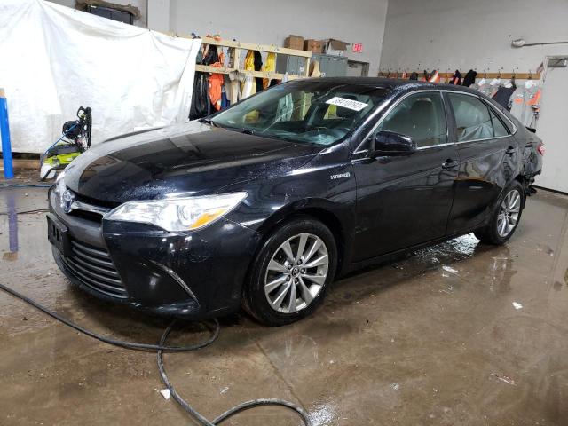 TOYOTA CAMRY HYBR 2015 with VIN 4T1BD1FK2FU169428 - Photo from auction