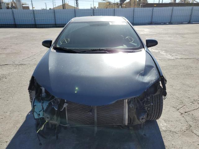Photo 5 from auction – 2014 TOYOTA COROLLA L with VIN 5YFBURHE2EP036559