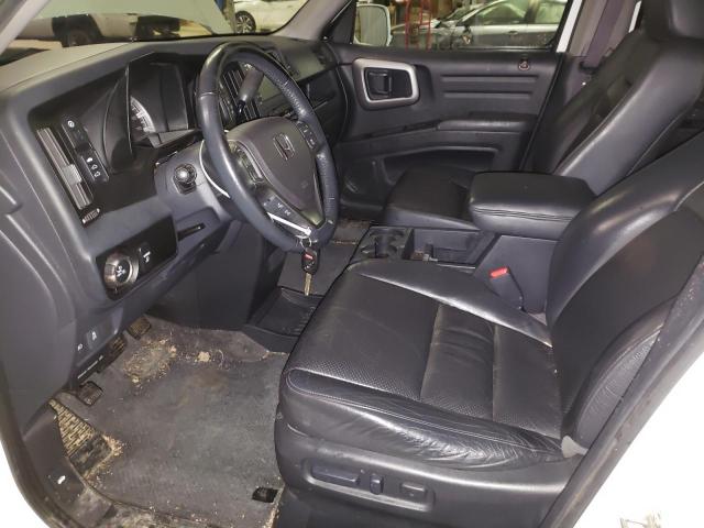 Photo 7 from auction – 2014 HONDA RIDGELINE with VIN 5FPYK1F63EB012836