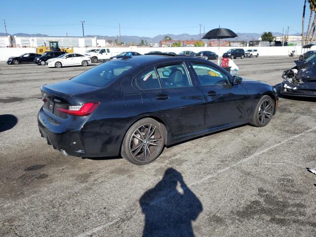 Photo 3 from auction – 2023 BMW 330I with VIN 3MW69FF0XP8C79898