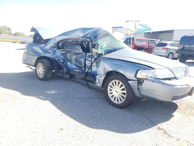 Photo 4 from auction – 2004 LINCOLN TOWN CAR E with VIN 1LNHM81WX4Y658940