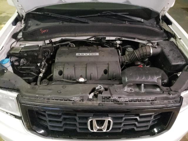 Photo 11 from auction – 2014 HONDA RIDGELINE with VIN 5FPYK1F63EB012836