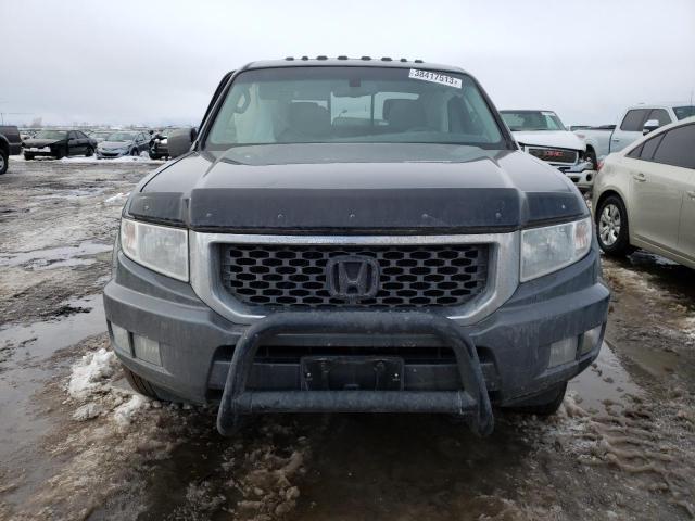 Photo 5 from auction – 2013 HONDA RIDGELINE with VIN 5FPYK1F52DB006614