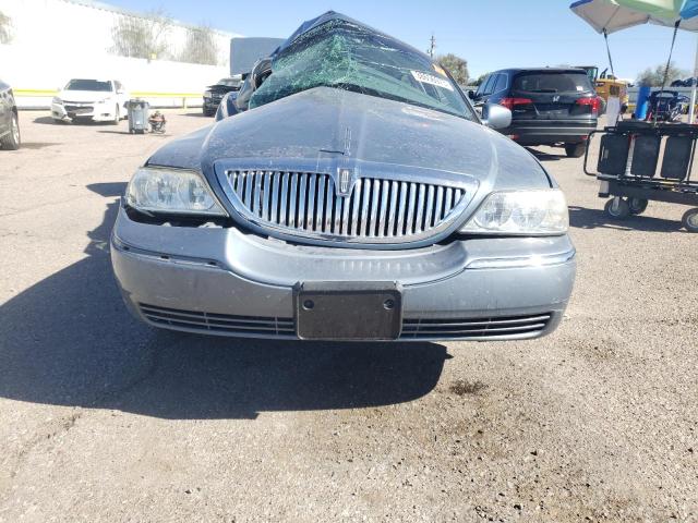 Photo 5 from auction – 2004 LINCOLN TOWN CAR E with VIN 1LNHM81WX4Y658940