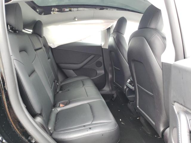 Photo 11 from auction – 2022 TESLA MODEL Y with VIN 7SAYGDEE7NF386969