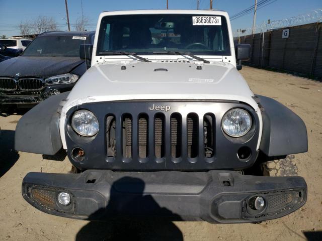 Photo 5 from auction – 2016 JEEP WRANGLER U with VIN 1C4BJWDG8GL109850
