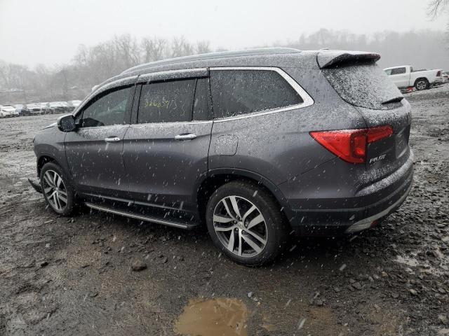 Photo 2 from auction – 2018 HONDA PILOT ELIT with VIN 5FNYF6H04JB051738