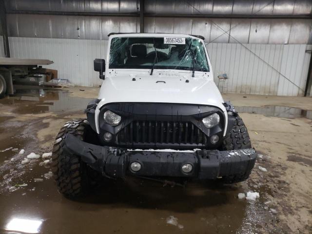 Photo 5 from auction – 2014 JEEP WRANGLER U with VIN 1C4BJWDG0EL140734