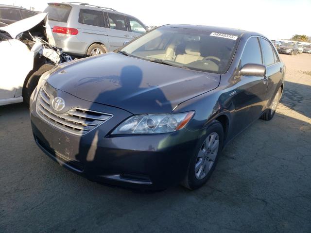 TOYOTA CAMRY HYBR 2007 with VIN JTNBB46K973020609 - Photo from auction