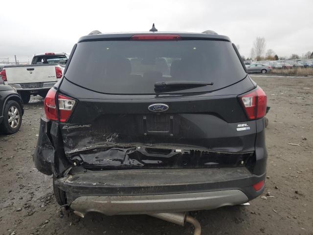 Photo 6 from auction – 2019 FORD ESCAPE SEL with VIN 1FMCU9HD7KUB79965