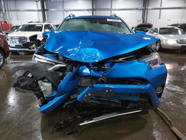 Photo 5 from auction – 2018 TOYOTA RAV4 LIMIT with VIN JTMDFREV0JJ221652