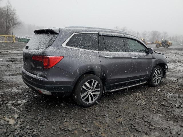 Photo 3 from auction – 2018 HONDA PILOT ELIT with VIN 5FNYF6H04JB051738