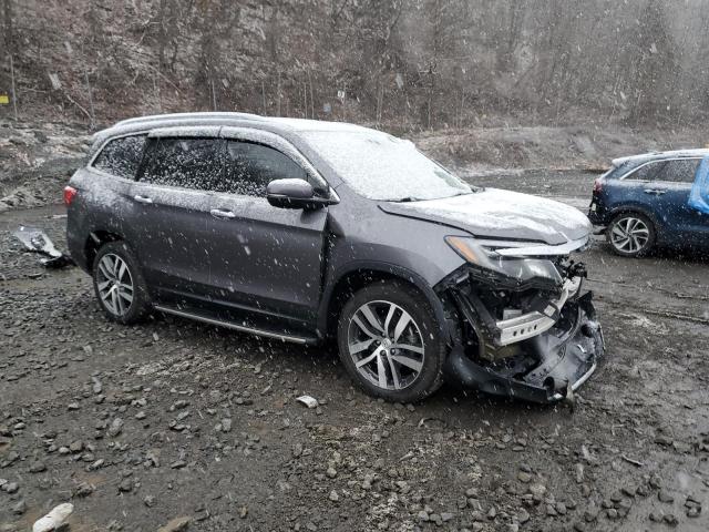 Photo 4 from auction – 2018 HONDA PILOT ELIT with VIN 5FNYF6H04JB051738