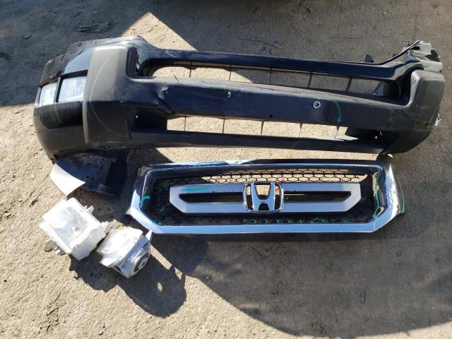 Photo 13 from auction – 2010 HONDA RIDGELINE with VIN 5FPYK1F59AB010753