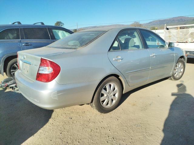Photo 3 from auction – 2002 TOYOTA CAMRY LE with VIN JTDBE30K120055296