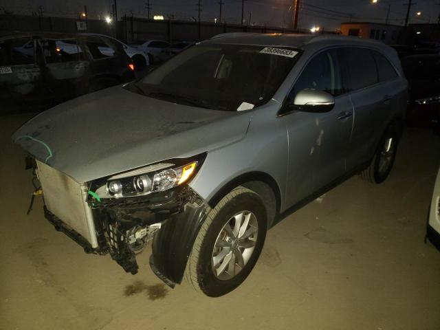 KIA SORENTO LX 2016 with VIN 5XYPG4A35GG002227 - Photo from auction