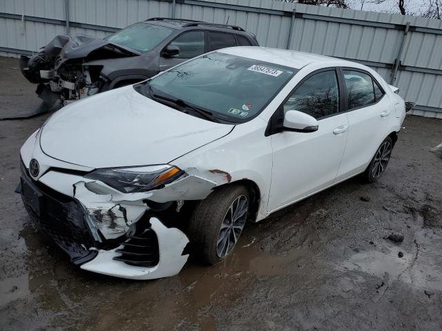 TOYOTA COROLLA L 2017 with VIN 5YFBURHE6HP709986 - Photo from auction